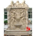 giant travertine wall fountain with lion and angel carving